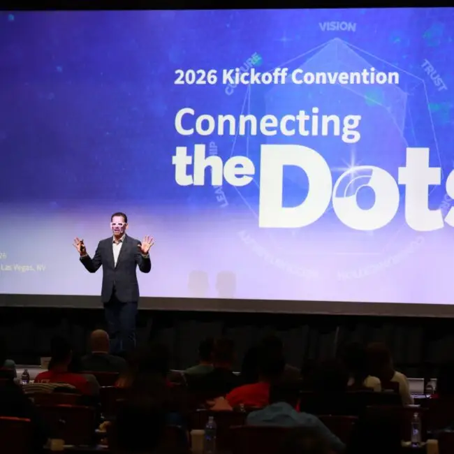 Chris Dyer on stage at a 2026 kickoff convention at Caesars Palace in Las Vegas