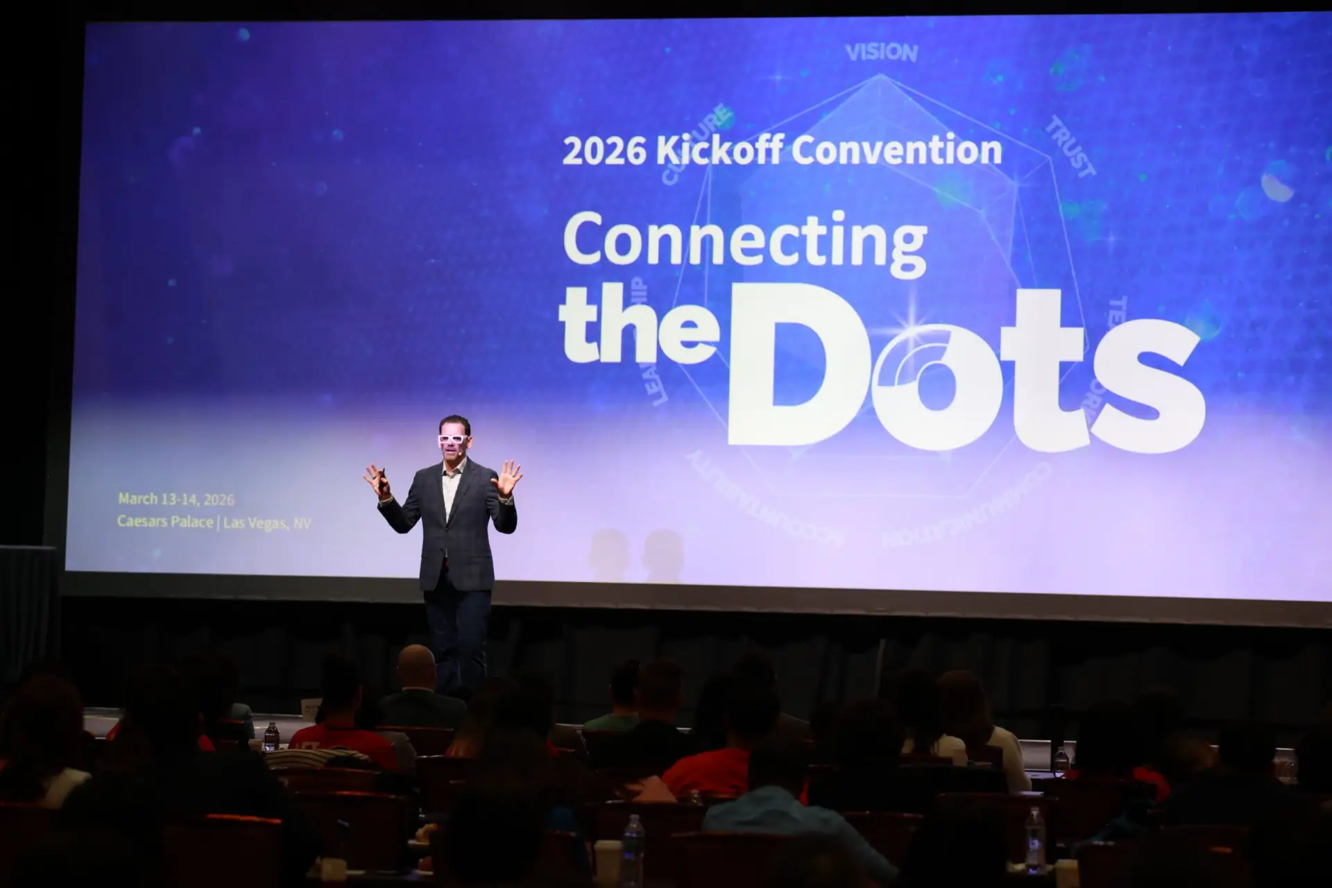 Chris Dyer on stage at a 2026 kickoff convention at Caesars Palace in Las Vegas